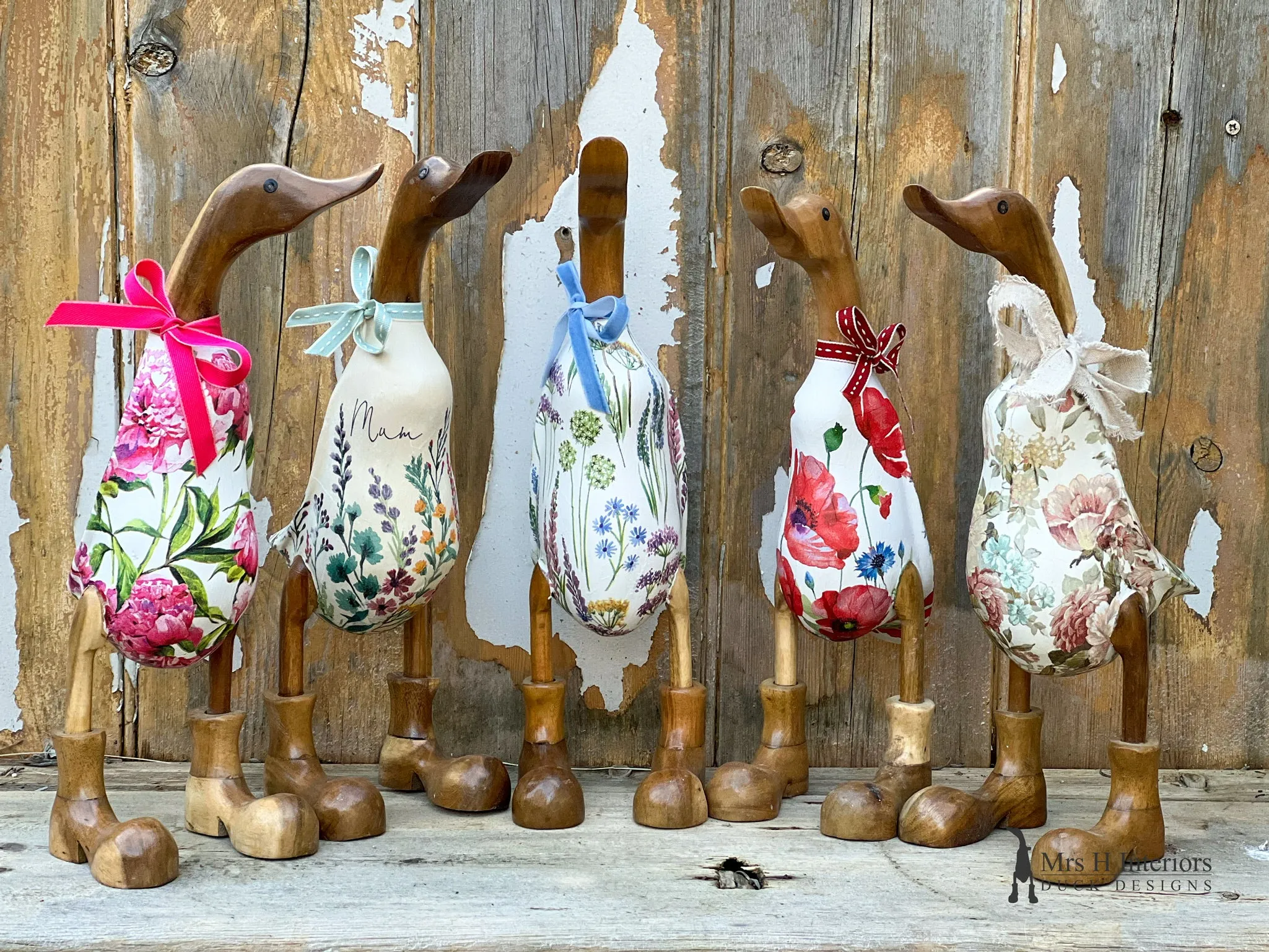 Devon - The hollyhocks and foxgloves decorated Wooden Duck in Boots by Mrs H the Duck Lady