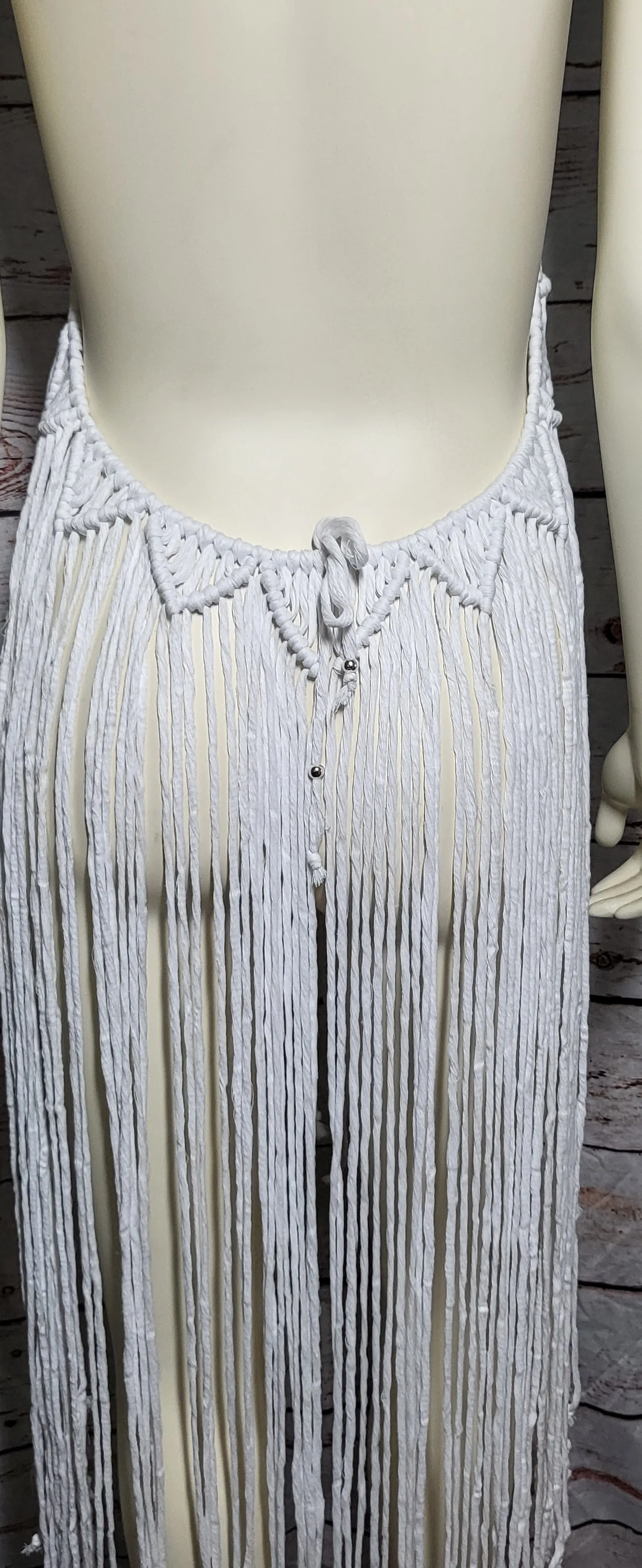 White macrame beach festival dress with silver necklace choker.